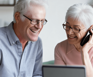 Middle aged couple reviewing Equity Trust  company retirement investing services.